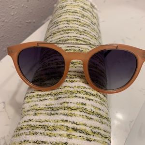 Cute double bridge coral color sunglasses.